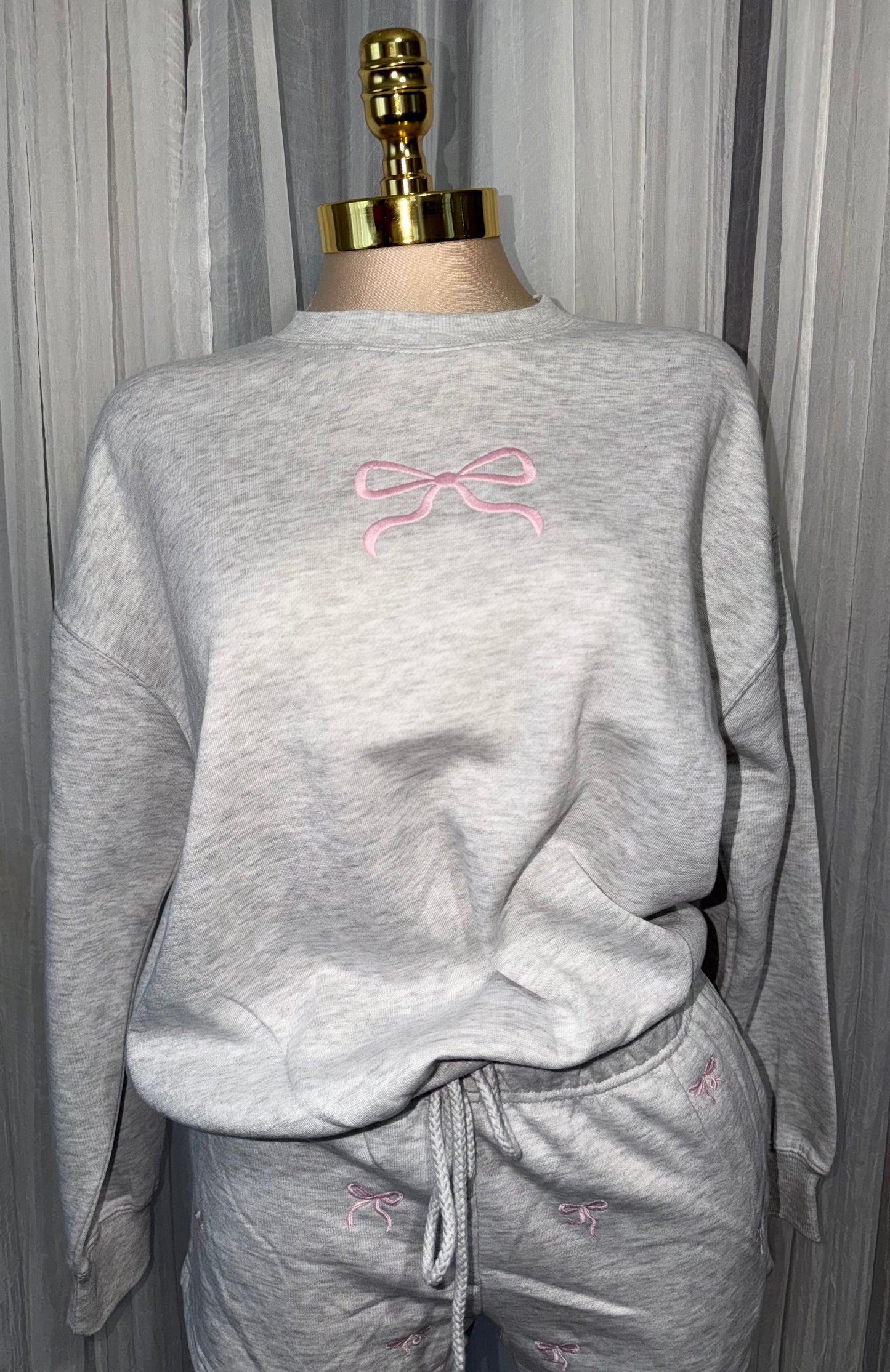 Embroidered bow sweater