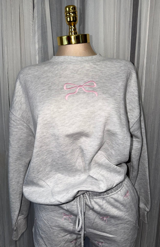 Embroidered bow sweater
